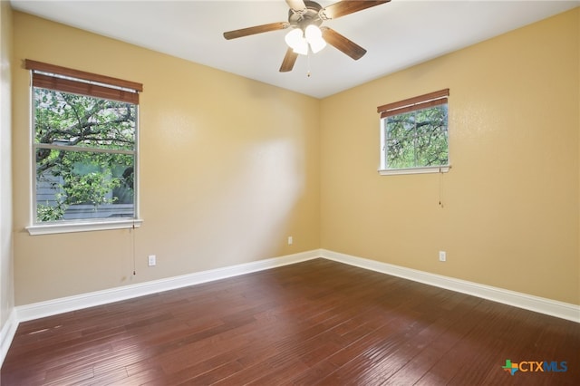 12109 Bryony Dr, Austin, TX 78739 - spare room with baseboards, hardwood / wood-style flooring, and ceiling fan
