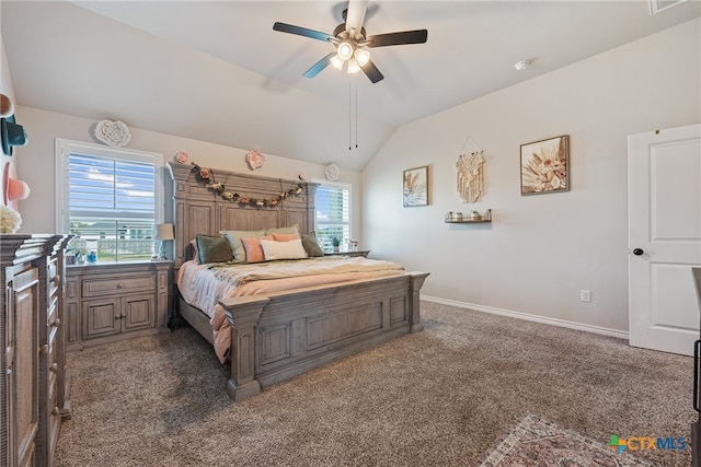 bedroom with ceiling fan, vaulted ceiling, and dark carpet