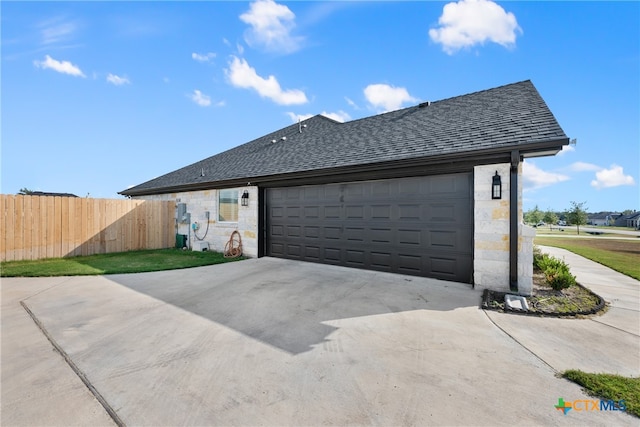 exterior space with a garage