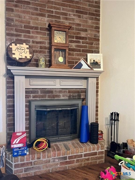 2019 Stonehenge Dr, Harker Heights, TX 76548 - detailed view of wood finished floors and a fireplace