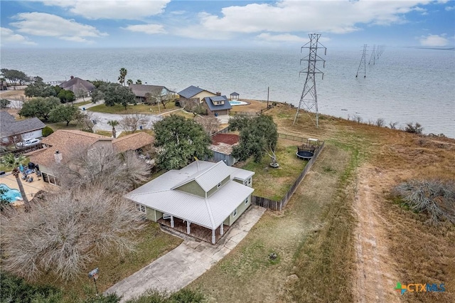 birds eye view of property featuring a water view