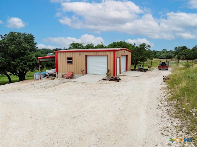 detached garage with fence