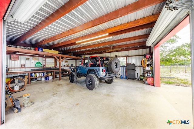 garage featuring metal wall