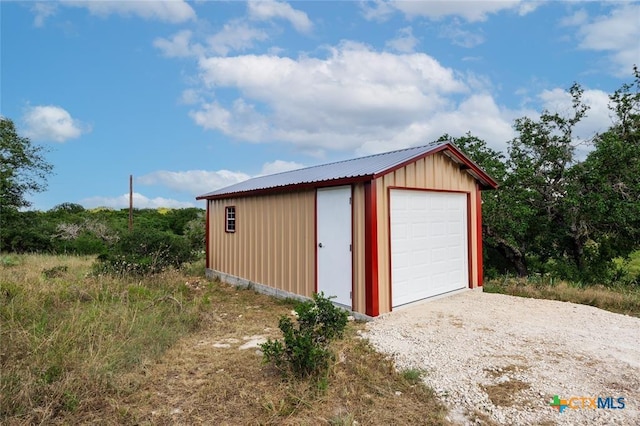 detached garage with driveway