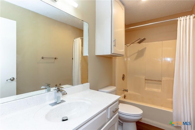 full bathroom with toilet, shower / bath combo, and vanity