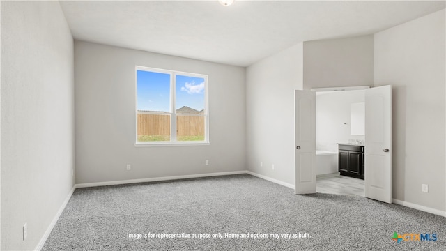 view of carpeted spare room