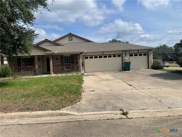 101 E Running Wolf Trl, Harker Heights, TX 76548 - ranch-style home featuring a porch, driveway, a garage, and brick siding