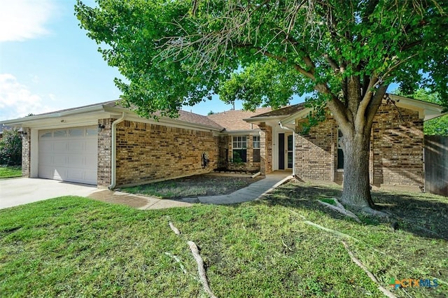 209 Brookway Dr, Killeen, TX 76542 - ranch-style house with brick siding, a garage, a front yard, and concrete driveway