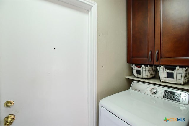 209 Brookway Dr, Killeen, TX 76542 - washroom featuring washer / clothes dryer and cabinet space