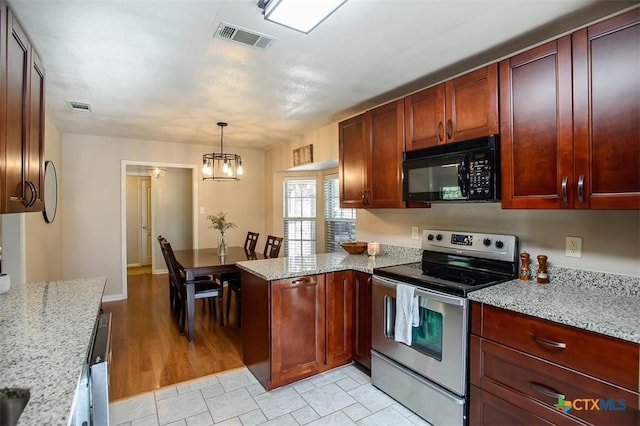 209 Brookway Dr, Killeen, TX 76542 - kitchen featuring black microwave, electric range, a peninsula, a chandelier, and light stone counters