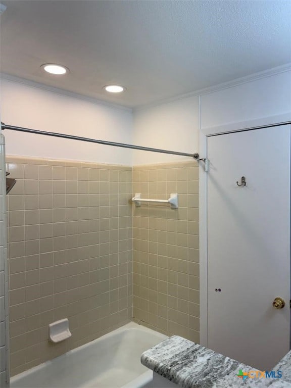 full bath featuring tub / shower combination and recessed lighting