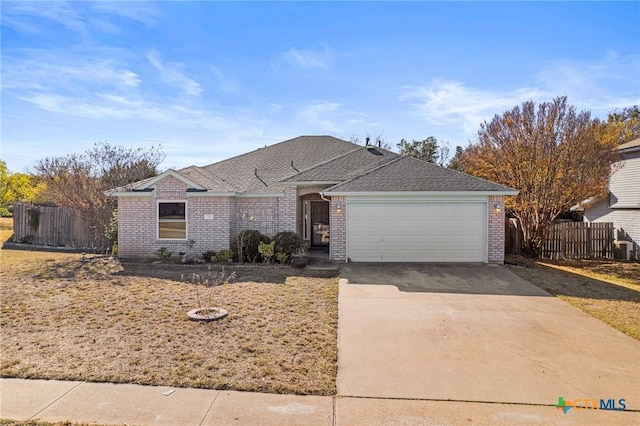 ranch-style house featuring a garage