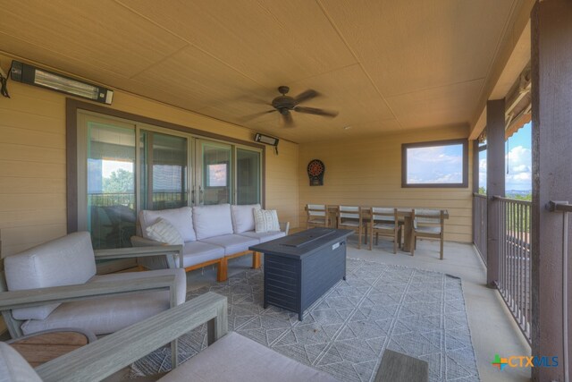 view of patio featuring outdoor lounge area and ceiling fan