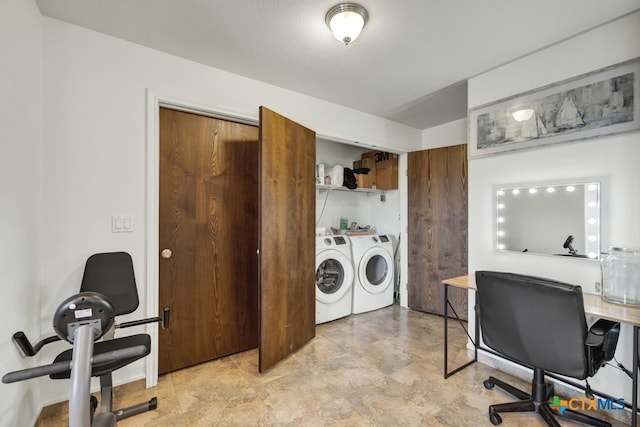 washroom with washer and dryer