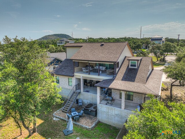 rear view of property with a patio