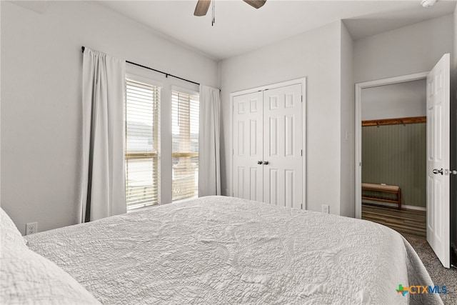 bedroom featuring a closet and a ceiling fan