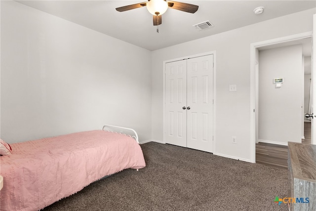 bedroom featuring carpet, visible vents, and baseboards