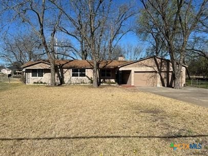 ranch-style house with a garage