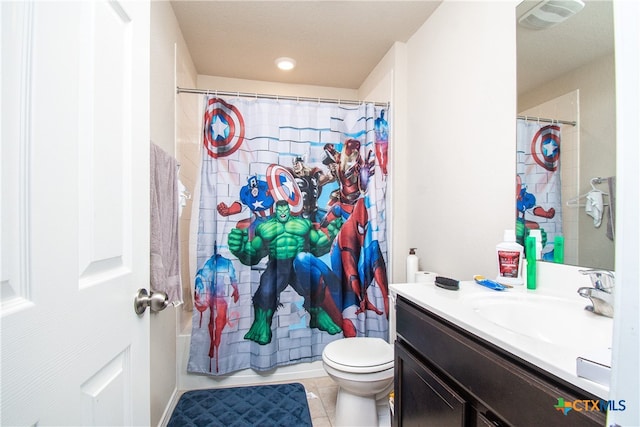 full bathroom with vanity, shower / bath combo, tile patterned floors, and toilet