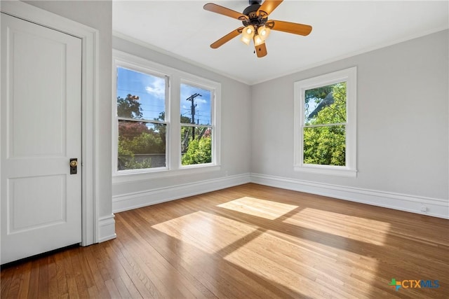 610 N 7th St, Temple, TX 76501 - empty room with hardwood / wood-style floors, crown molding, and ceiling fan