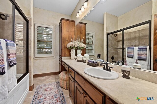105 Flint Ridge Trl, Georgetown, TX 78628 - bathroom featuring vanity and tile patterned flooring