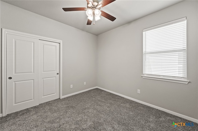 unfurnished room featuring carpet floors and ceiling fan