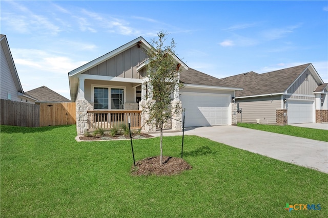 craftsman-style house with a garage, a porch, and a front lawn