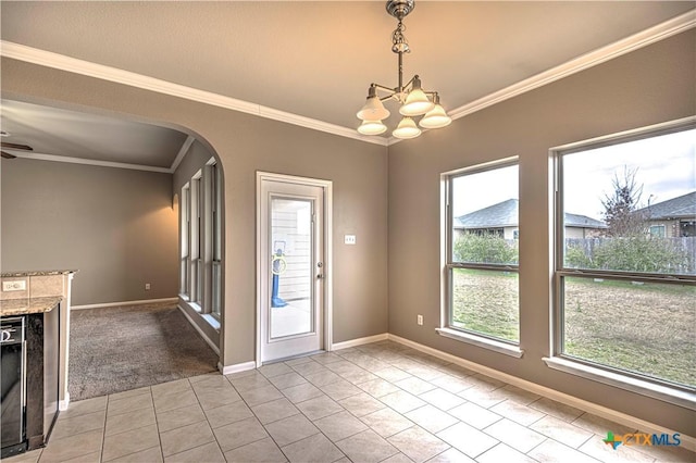 interior space featuring light tile patterned floors, ceiling fan with notable chandelier, and ornamental molding