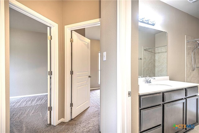 bathroom with vanity and walk in shower