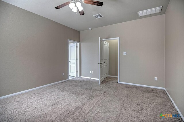 bathroom with tile patterned flooring, vanity, and a washtub