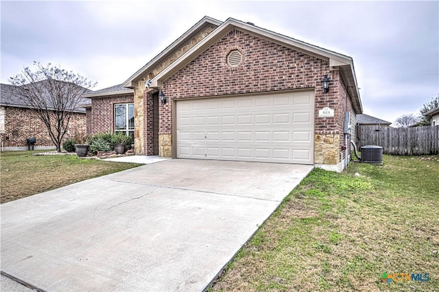 single story home featuring an attached garage, brick siding, fence, driveway, and a front yard