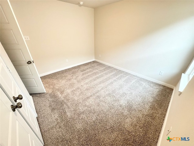 unfurnished bedroom featuring carpet flooring