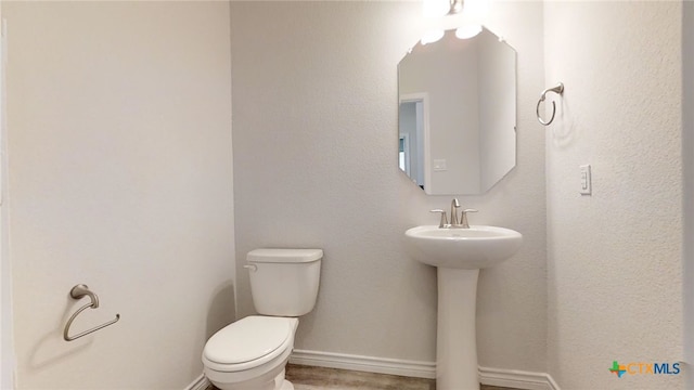 5105 Othello Dr, Belton, TX 76513 - bathroom featuring toilet and wood finished floors