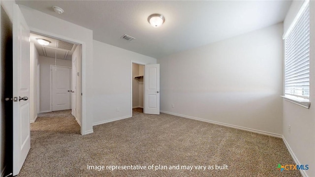 5105 Othello Dr, Belton, TX 76513 - unfurnished bedroom featuring attic access, carpet flooring, and multiple windows