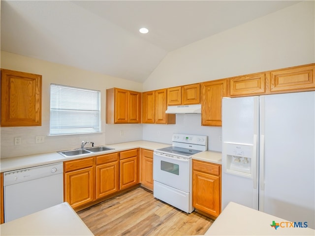 kitchen with white appliances, light hardwood / wood-style flooring, lofted ceiling, and sink