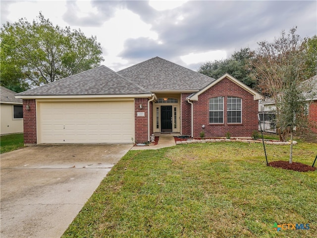 ranch-style house with a front lawn and a garage