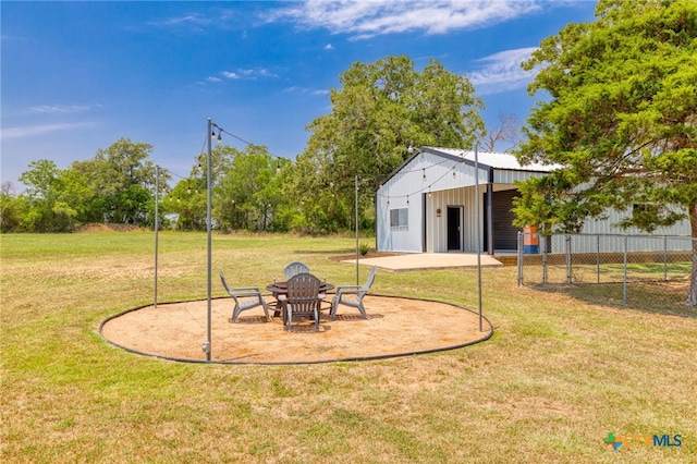 1600 Cattlemens Row, Lockhart, TX 78644 - view of yard featuring an outbuilding and an outdoor structure