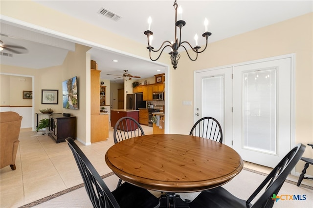 1600 Cattlemens Row, Lockhart, TX 78644 - dining space featuring ceiling fan, a chandelier, light tile patterned floors, and recessed lighting
