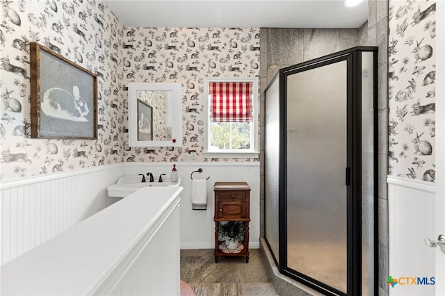 1600 Cattlemens Row, Lockhart, TX 78644 - full bath with a stall shower, wallpapered walls, vanity, and wainscoting