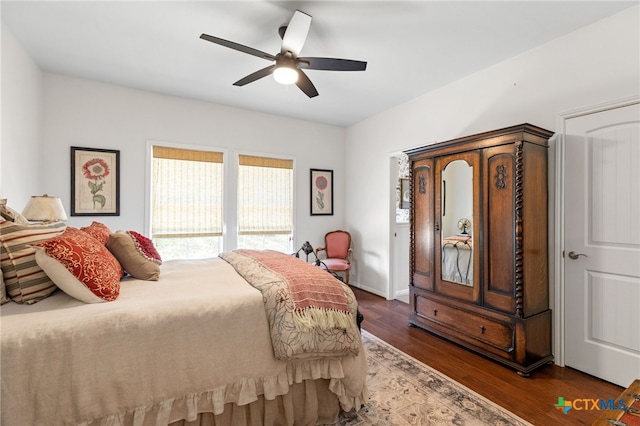 1600 Cattlemens Row, Lockhart, TX 78644 - bedroom with dark wood-style floors and a ceiling fan