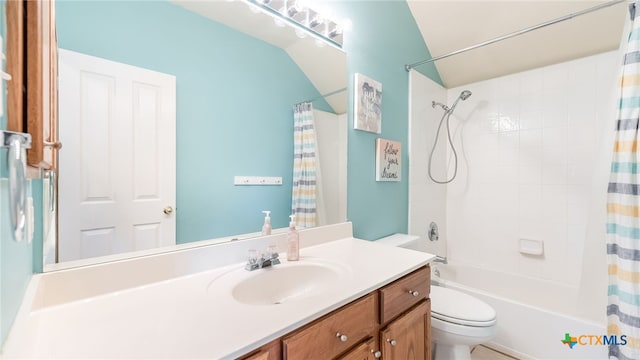 full bathroom with vanity, shower / bath combination with curtain, and toilet