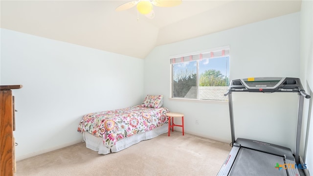 bedroom with light carpet, vaulted ceiling, and ceiling fan