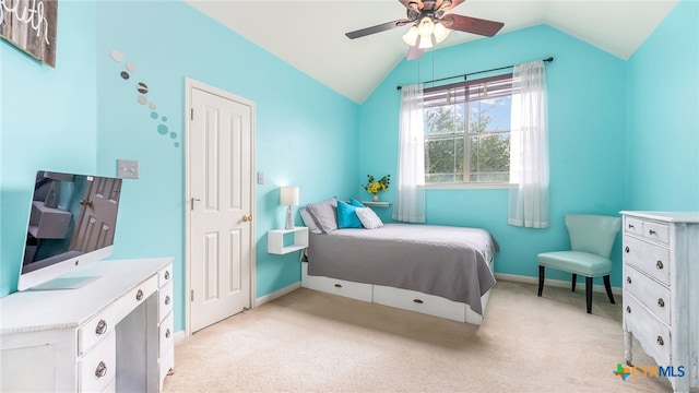 carpeted bedroom featuring ceiling fan and lofted ceiling