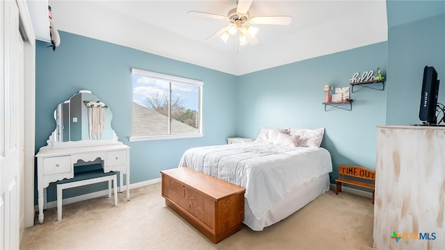 carpeted bedroom featuring ceiling fan