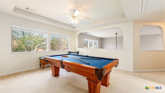 recreation room with a tray ceiling, ceiling fan, and pool table