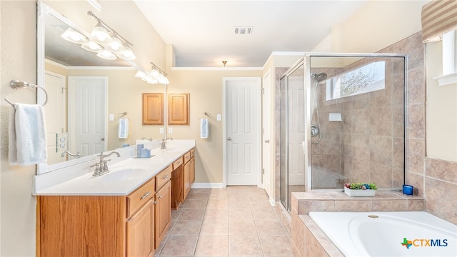 bathroom featuring tile patterned flooring, vanity, a chandelier, and separate shower and tub