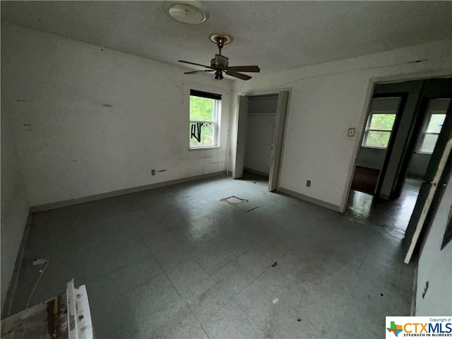 spare room featuring ceiling fan