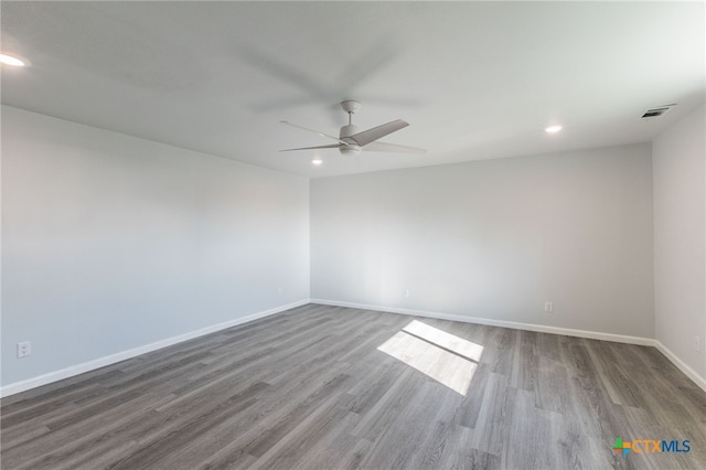 501 College Ave, Florence, TX 76527 - empty room featuring recessed lighting, wood finished floors, and a ceiling fan