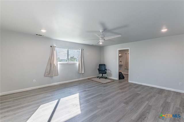 501 College Ave, Florence, TX 76527 - unfurnished room with a ceiling fan, wood finished floors, and recessed lighting