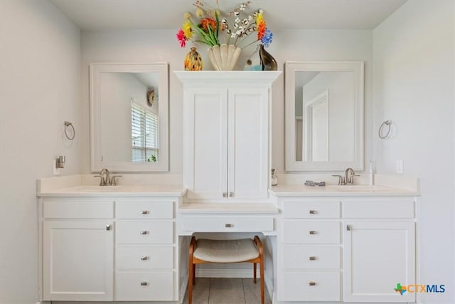 17179 Cyclone Rd, Burlington, TX 76519 - bathroom featuring double vanity